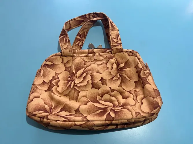 Bolsa de mão florida