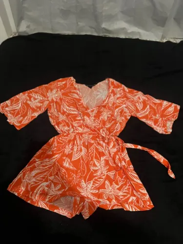 Macacão floral laranja