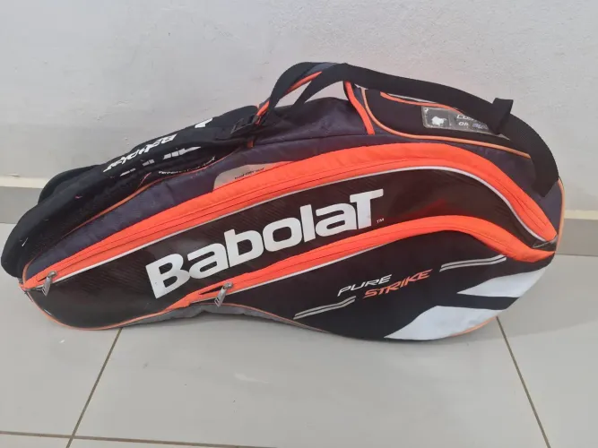 Raqueteira Babolat Pure Strike + raquete de tênis Wilson Advantage 95