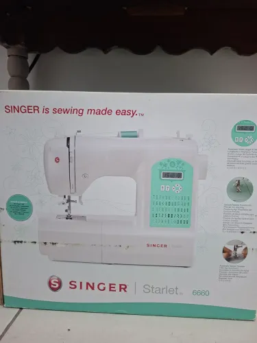 Vendo Máquina de Costura Singer Starlet 6660! Ainda na caixa, nunca foi usada.