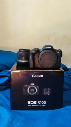 Câmera Canon EOS R100 + Lente 18-45mm + Kit de limpeza