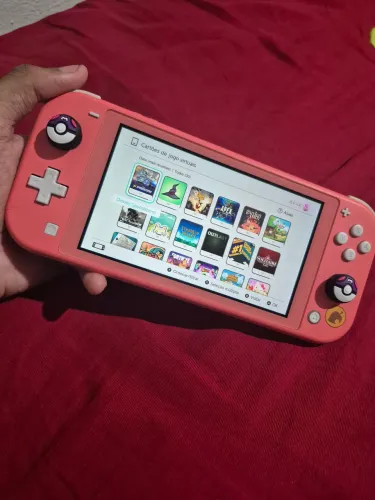 Nintendo Switch Lite, original e vai com jogos!
