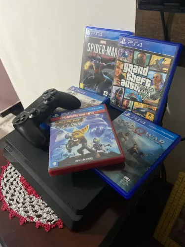 Ps4 slim + 5 jogos físicos