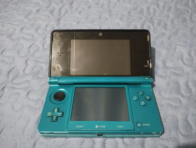 Nintendo 3DS Old Aqua Blue desbloqueado, funcionando normalmente.