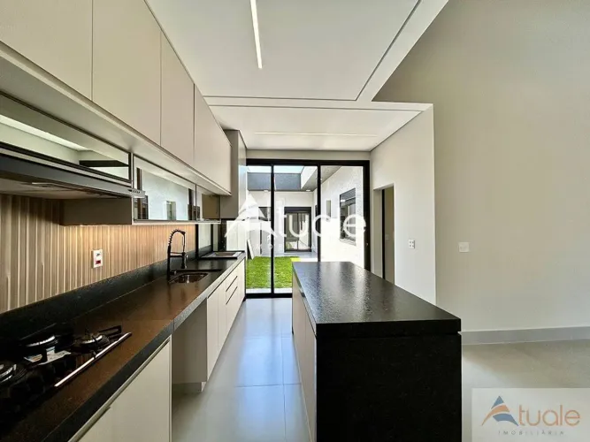 Casa com 3 dormitórios à venda, 147 m² por R$ 1.260.000,00 - Residencial Jardim dos Lírios