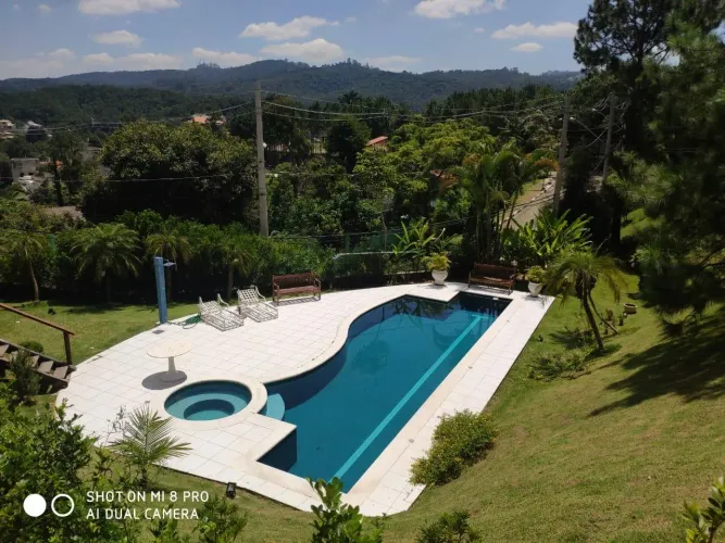 Casa com 4 dormitórios à venda, 850 m² por R$ 3.500.000,00 - Condomínio Refúgio dos Pinhei