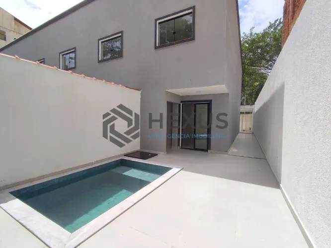 Casa geminada com Piscina e Area Gourmet na Praia das Asturias, Guaruja
