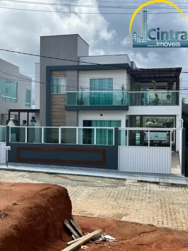 Vendo casa em Lauro de Freitas, 3 suítes, 300m² de área de terreno, condomínio fechado, R$