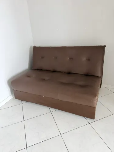 Sofá cama couro