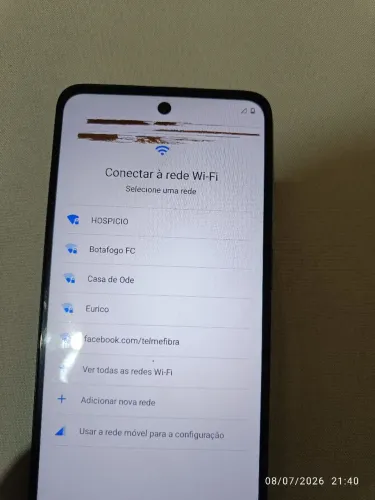Moto 22 funcionando normal porém tem uma mancha na tela pequena