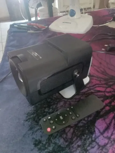 Projetor 4k funcionando peerfeitamente facilito aquui no centro
