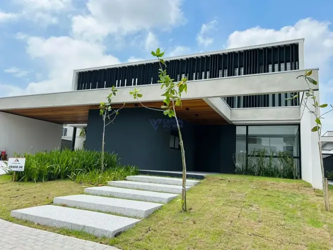 Casa com 4 dormitórios à venda, 398 m² por R$ 3.650.000,00 - Condomínio Residencial Colina