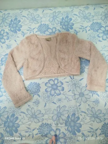 Casaquinhos da Milon e carinhoso e um colete da kukie