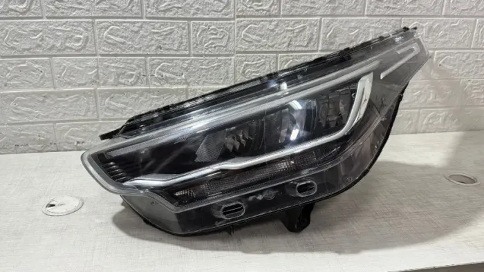 Farol esquerdo Strada full Led 2021/2025 original