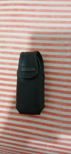 Porta canivete, isqueiro ou ferramenta.
