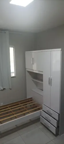 Guarda roupa com cama conjugada