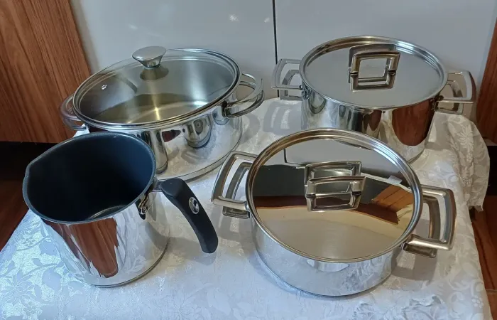 Conjunto de panela tramontina inox quatro  seminovos 