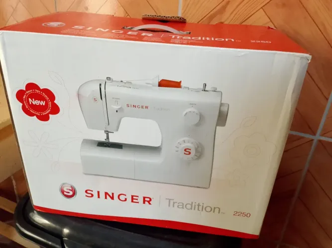 Máquina de costura singer