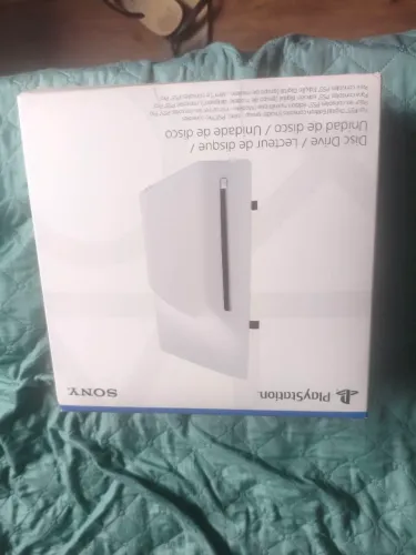 Leitor de ps5 na caixa, muito novo