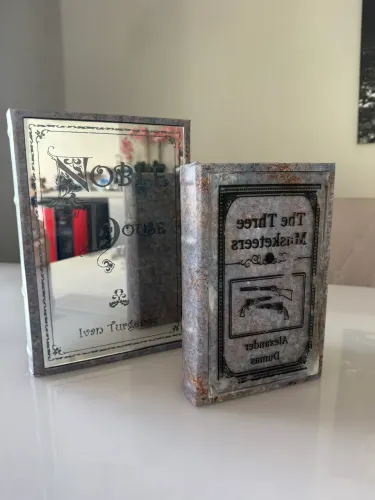 Dupla de livros de decoração