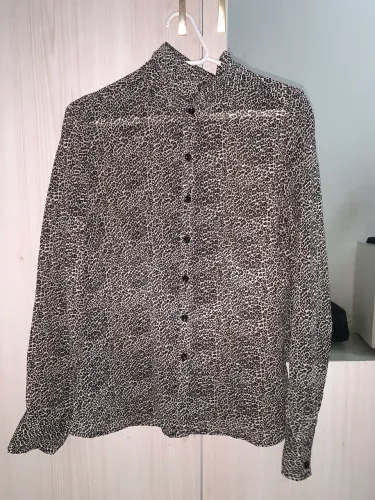 Blusa animal print manga longa