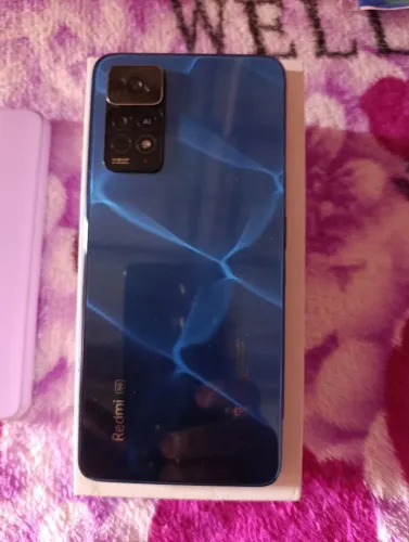 Vendo celular redmi 11pro 5g em perfeito estado nunca deu defeito completo caregado 2 caix