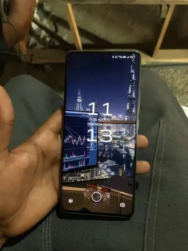 Vendo celular redimi note 14 5 g semi novo