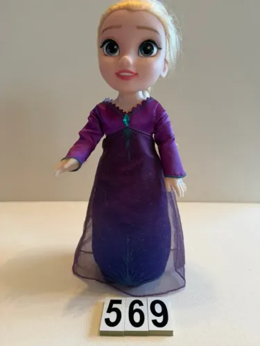 BONECA Elza Jakks Pacific , canta e acende o vestido