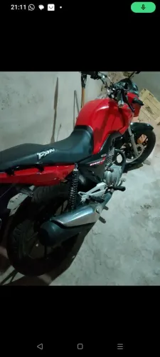 Vendo fan 150 toda certinha no meu nome 
