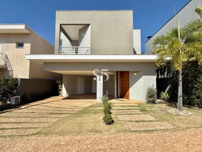 Oportunidade única: Sobrado com fundo para área preservada, 5 suítes, 4 vagas de garagem n