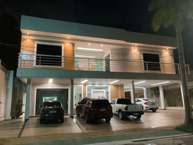 GreenVille 1 Casa de 5 Suítes Sala com pé direito Duplo e piscina com cascata
