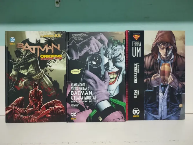 HQ DC a piada mortal, Batman origens e Superman terra um.