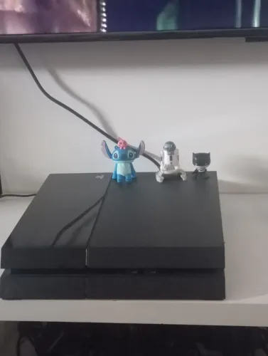 Vendo PS4 em bom estado de conservação tem até a caixa 
