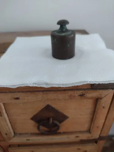 Peso de cobre de 100 gramas.