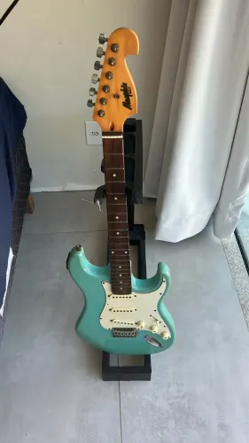 Guitarra, amplificador e capa