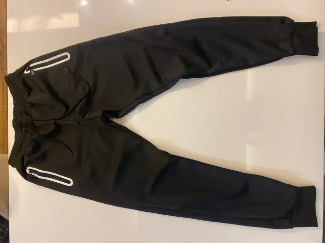 Calça Moletom Bolsos Vedados Preta