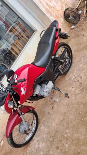 Moto vermelha 125 tudo em dias