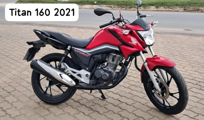 Titan Novinha troco por carro.