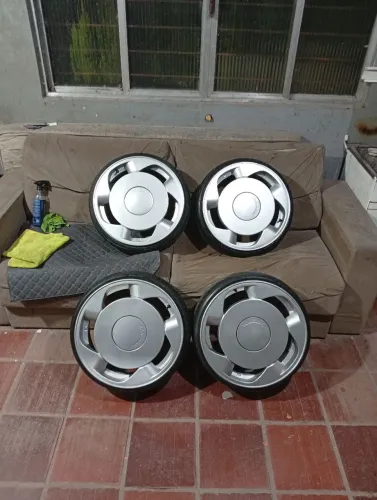 Rodas orbital 18 furaçao 4x100 pneus novos tala 6 
