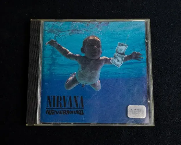 CDs Nirvana - Nevermind, Nirvana - Unplugged in New York e R.E.M. - Out of Time