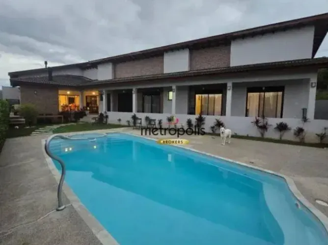 Casa com 4 dormitórios à venda, 255 m² por R$ 1.800.000,00 - Condomínio Jardim Flamboyan -