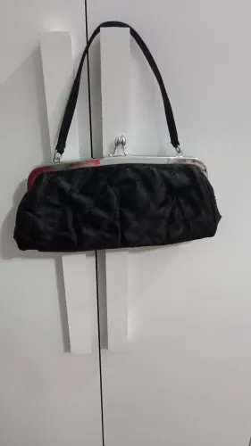 Vendo uma bolsa de festa.