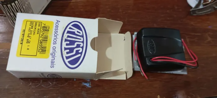 Controle remoto RX para acionar portão eletrônico com farol alto do carro.