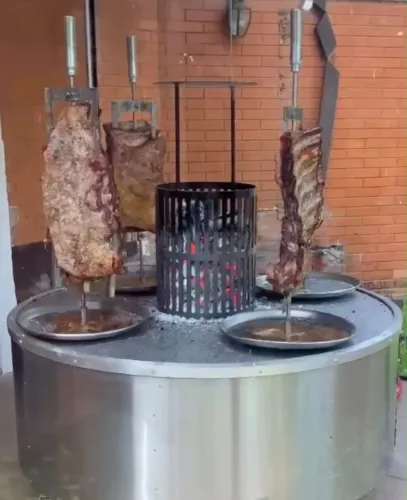 Churrasqueira rotativa tipo fogo de chão redonda