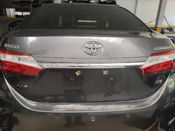 tampa traseira corolla 20