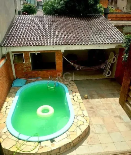 Casa com piscina 3 dormitórios e 2 Costa e Silva Zona Norte de Porto Alegre