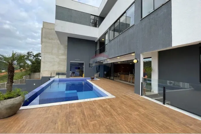 Casa de Cinema locação Spina Ville - 4 suites, quadra de Beach Tênis - piscina , área gour