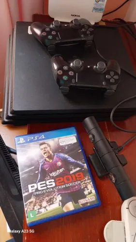 Ps4 pro 1tb + 2 controles + câmera playstation + carregador original