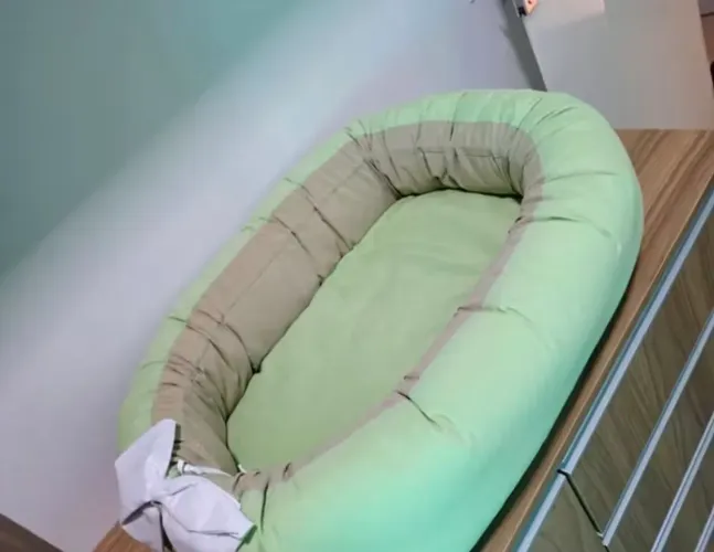 Ninho redutor de berço