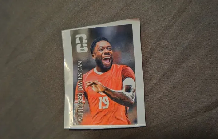 Figurinha Coca Cola CC11 Alphonso Davies copa do mundo 2026